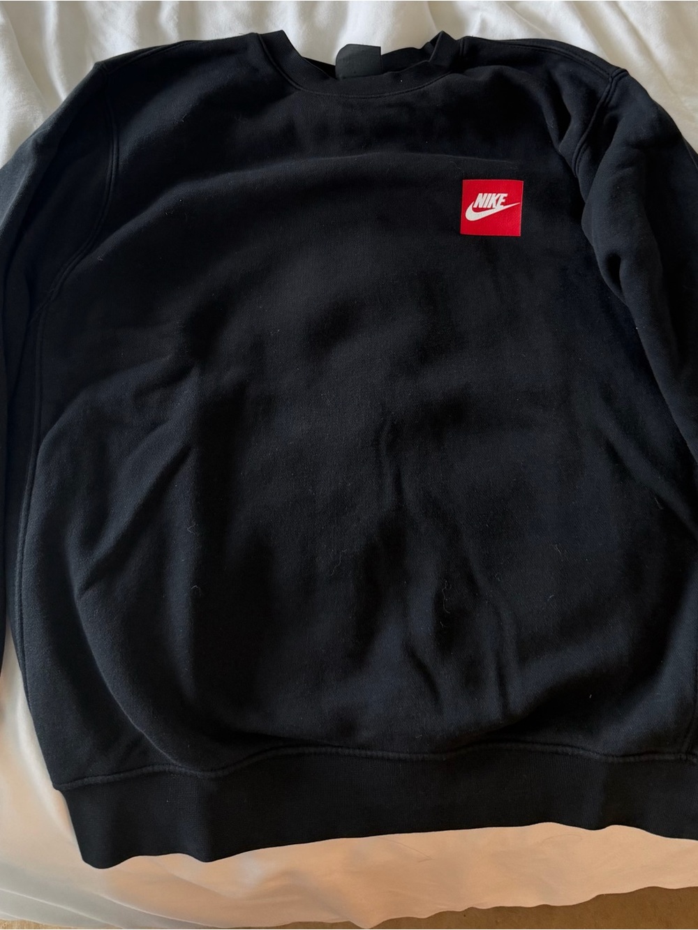 Nike Black Crewneck Sweatshirt with Red Logo Patch